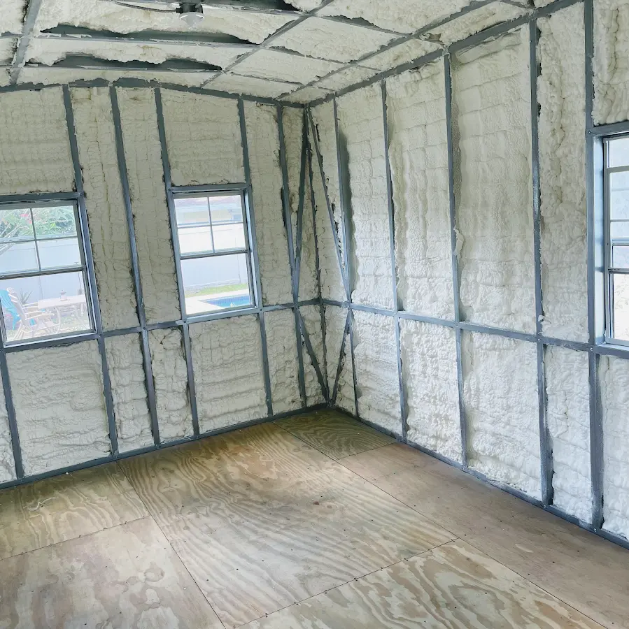 Closed-cell spray foam insulation applied to wall cavities in a residential project in South Haven